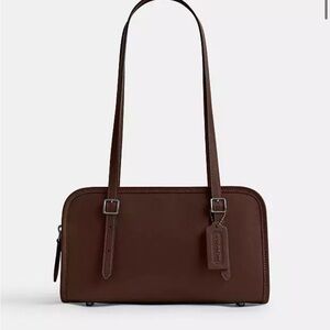 Coach Swing Zip bag in brown leather